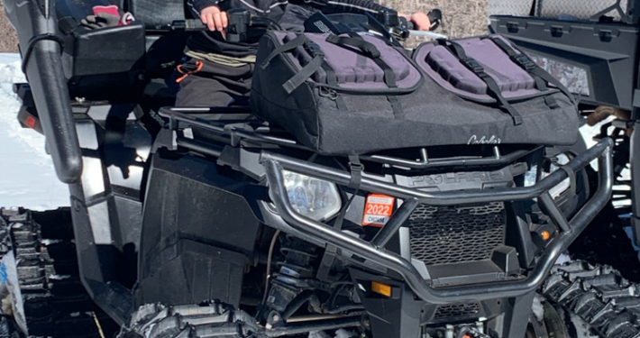 Boy with Snow Vehicle