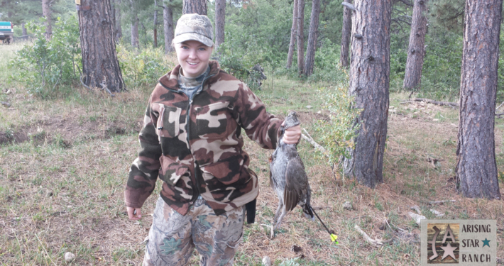 Holding a Pheasant Bird