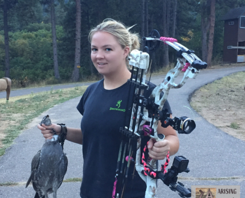 Holding a Bird and Bow